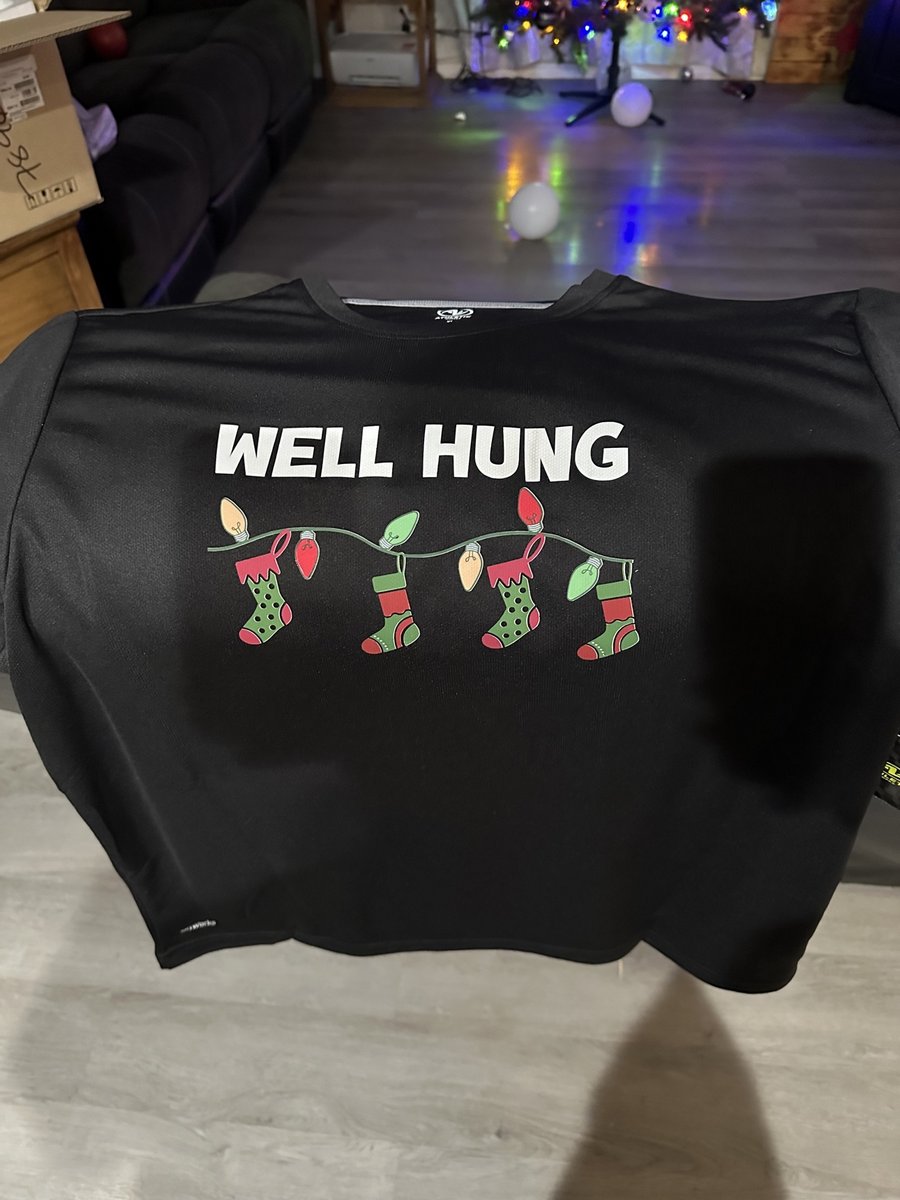 Black Christmas t-shirt with a stockings and lights design, by KB Custom Creations