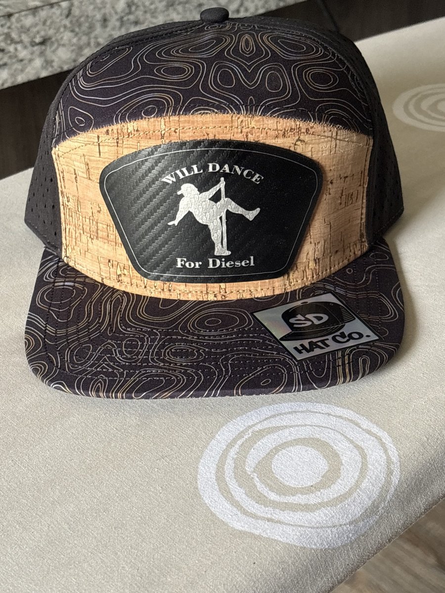 Cork-front hat with a Will Dance For Diesel patch and lineman silhouette, by KB Custom Creations