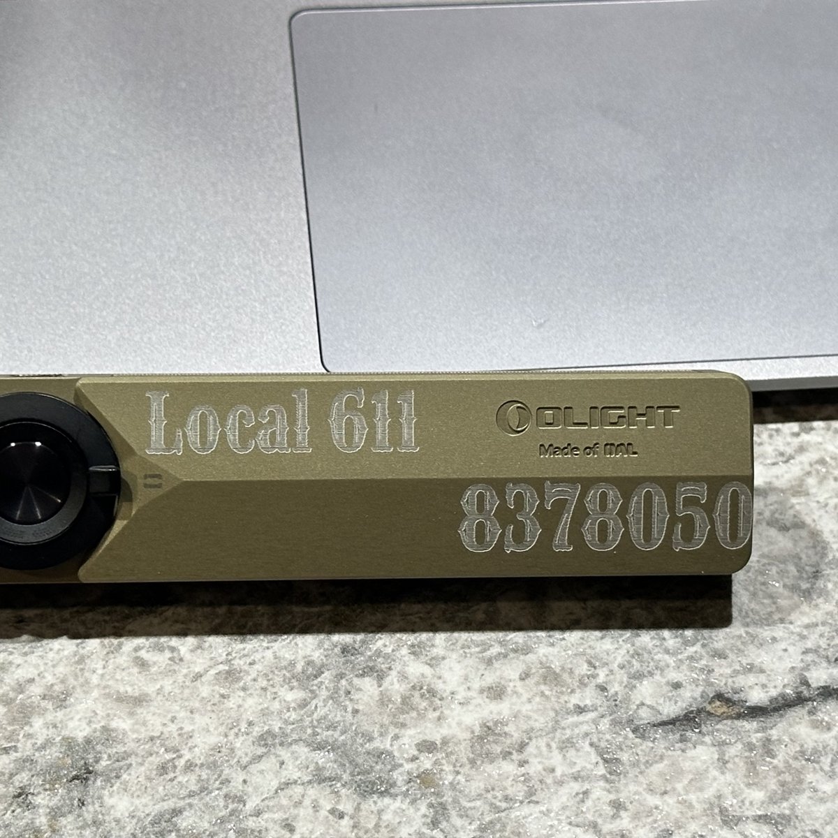 Flashlight laser-engraved with a union local design, by KB Custom Creations