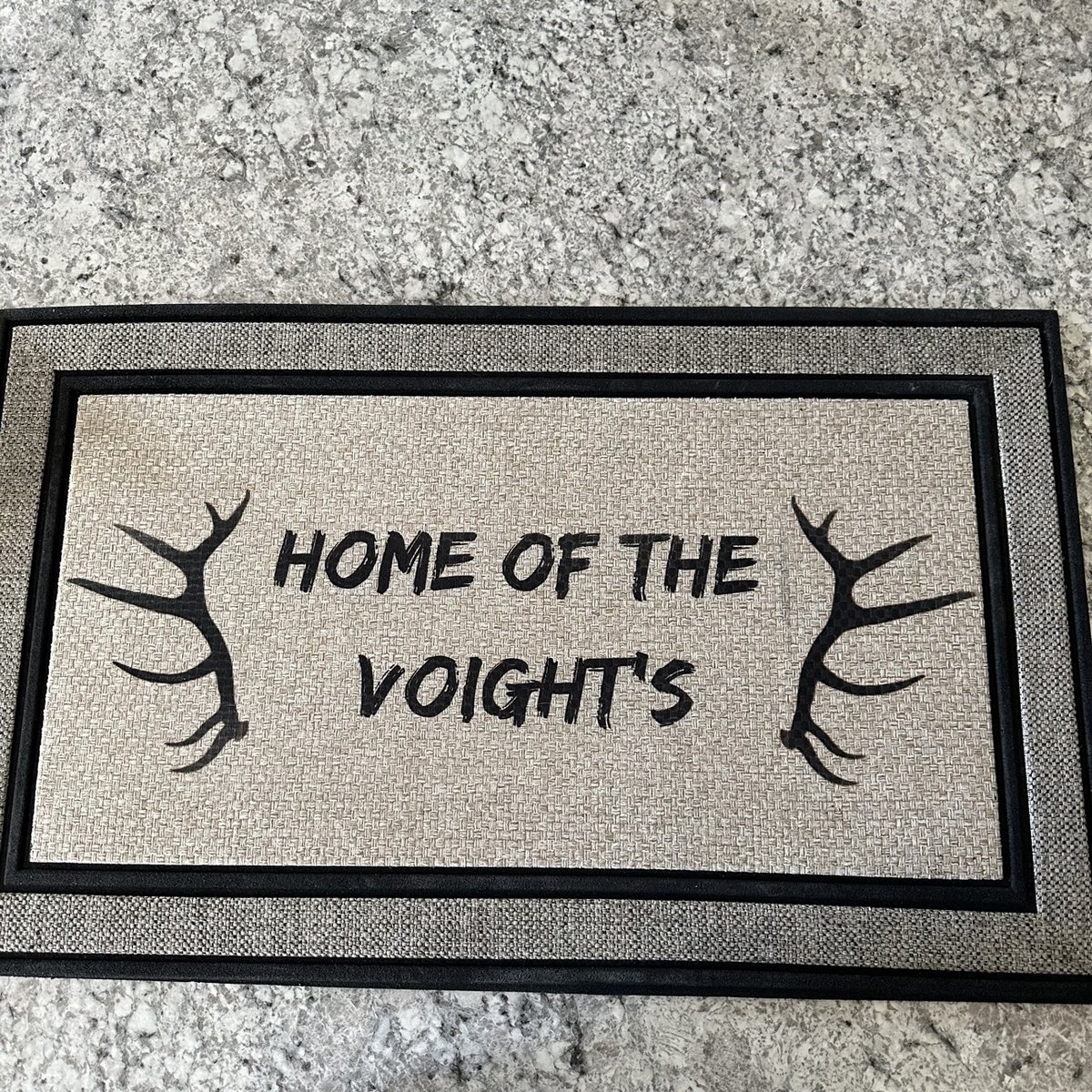Personalized doormat with a family name and antler designs, by KB Custom Creations