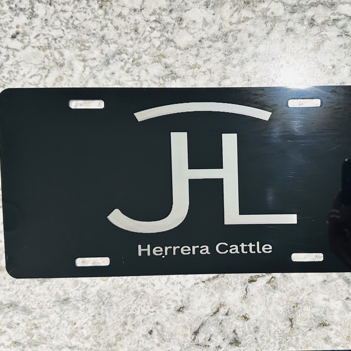 Black engraved license plate with a cattle brand and ranch name, by KB Custom Creations
