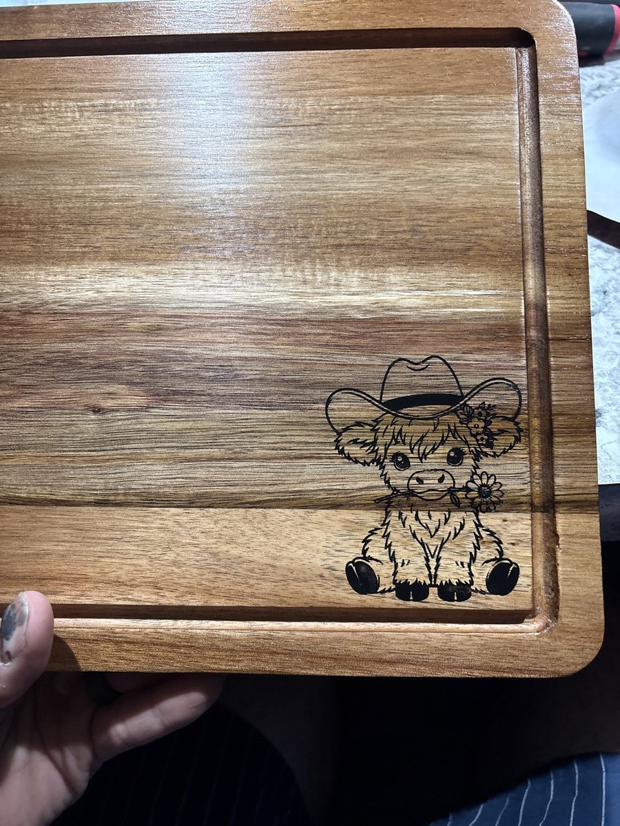 Wood cutting board engraved with a Highland cow wearing a cowboy hat, by KB Custom Creations